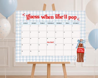 May include: A baby shower calendar with a blue gingham pattern and the text "guess when she'll pop". A brown soda bottle with a blue bow is on the right. Blue and white balloons are in the background.