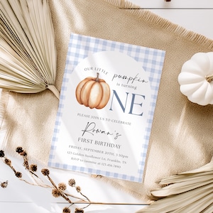 May include: A light blue gingham-patterned invitation with a watercolor pumpkin illustration. The text reads "Our Little Pumpkin is turning ONE" and includes details for Rowan's first birthday.