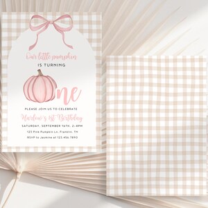 May include: A pink and tan gingham-patterned invitation for a first birthday. The invitation features a pink pumpkin illustration and the text "Our little pumpkin is turning one." The invitation includes event details.