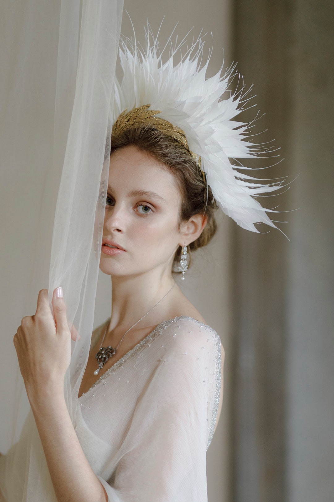 bridal headpiece with feathers
