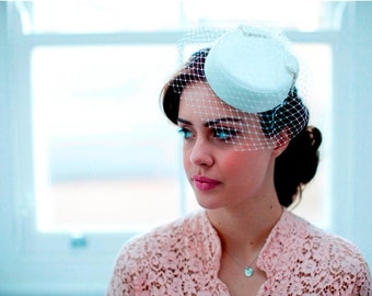 Ivory Pillbox Hat With Birdcage Veil 