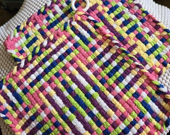 Colorful potholders with free gift bow.