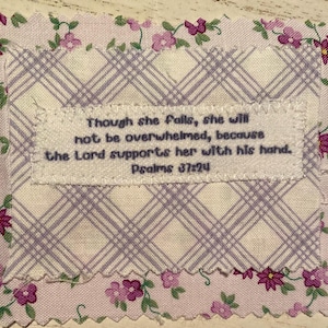 May include: A set of three ceramic mugs with a speckled, matte finish. Each mug features a different color: light blue, cream, and gray. The mugs have a simple, modern design with a rounded shape and a comfortable handle.