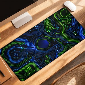 May include: A rectangular desk mat featuring a black background with a vibrant digital circuit board pattern in neon green and electric blue lines, dots, and geometric shapes that create a high-tech, interconnected electronic aesthetic.