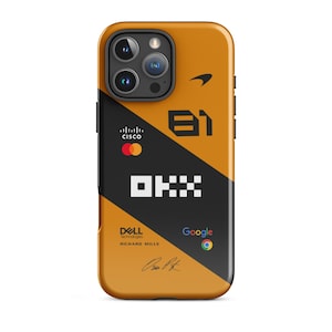 May include: Orange and black phone case with a design featuring the McLaren logo, Cisco, Dell Technologies, and Google logos. The case has a glossy finish and a black stripe. The design includes the number "81" and the letters "OKX".