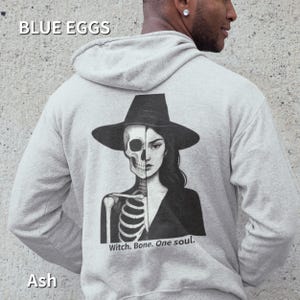 Witch Skeleton Hoodie – Gothic Half Skull Half Witch Pullover for Halloween | Spooky Dark Art Sweatshirt | Witchcore Unisex Hoodie
