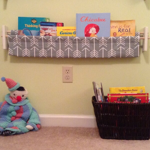 nursery book storage - grey arrows - book storage shelf sling decor bedroom organization gender neutral boy girl modern