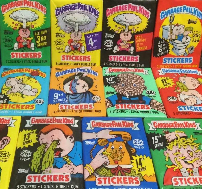May include: A collection of vintage Garbage Pail Kids sticker packs. The packs feature colorful illustrations of grotesque characters and the text "STICKERS" and "BUBBLE GUM". The series numbers are visible on the packs.