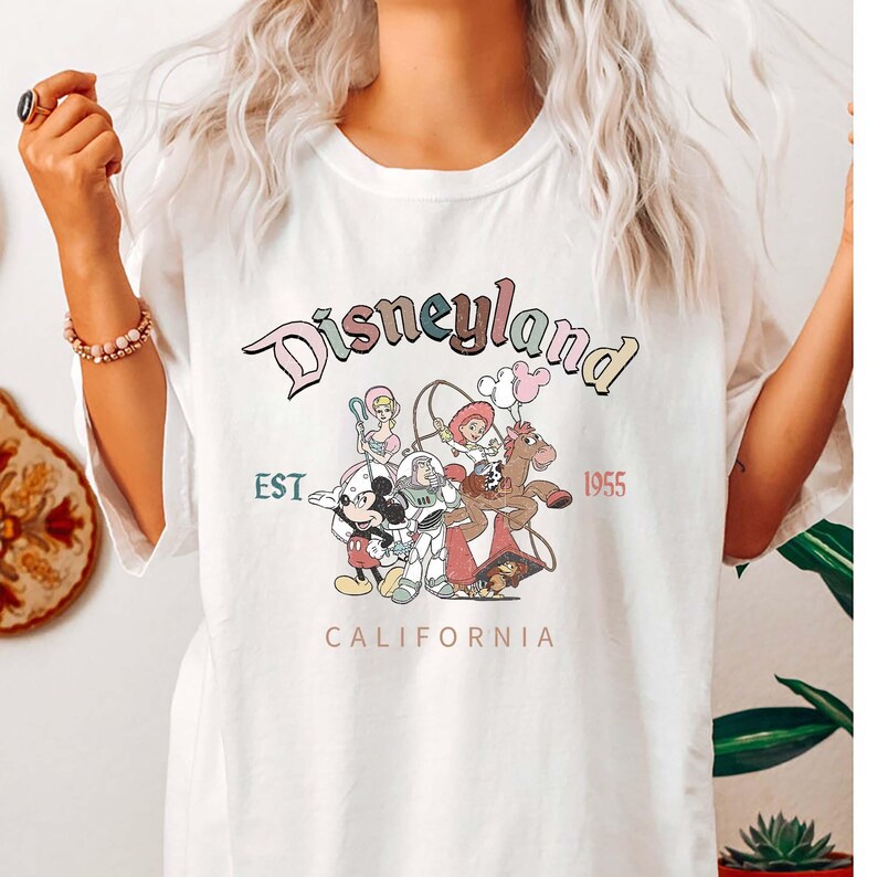 May include: A trio of ceramic mugs with a speckled, matte finish in cream, light grey, and dark grey. Each mug features a simple, minimalist design, ideal for tea or coffee.