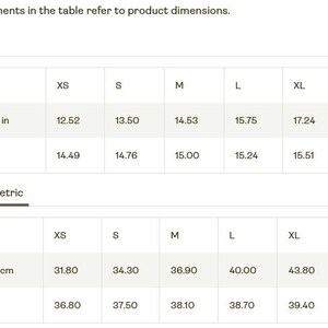 K&ouml;nnte beinhalten: Eine Tabelle zeigt Produktma&szlig;e in Zoll und Zentimetern. Die Tabelle listet Taillenweite und L&auml;nge f&uuml;r die Gr&ouml;&szlig;en XS bis 2XL auf. Der Text oben lautet: &bdquo;Alle Ma&szlig;e in der Tabelle beziehen sich auf die Produktabmessungen.&ldquo;