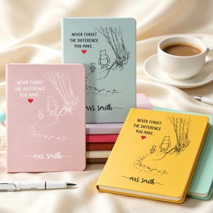 May include: A collection of rectangular notebooks in pastel pink, light blue, and yellow. Each notebook features a line drawing of Winnie the Pooh and Piglet, a red heart, the text "NEVER FORGET THE DIFFERENCE YOU MAKE...", and "mrs. smith".