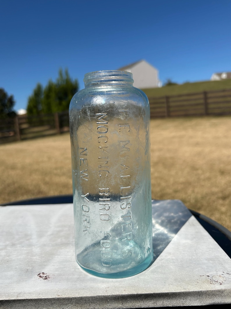 F.E. McAllister's Mocking Bird Food Bottle