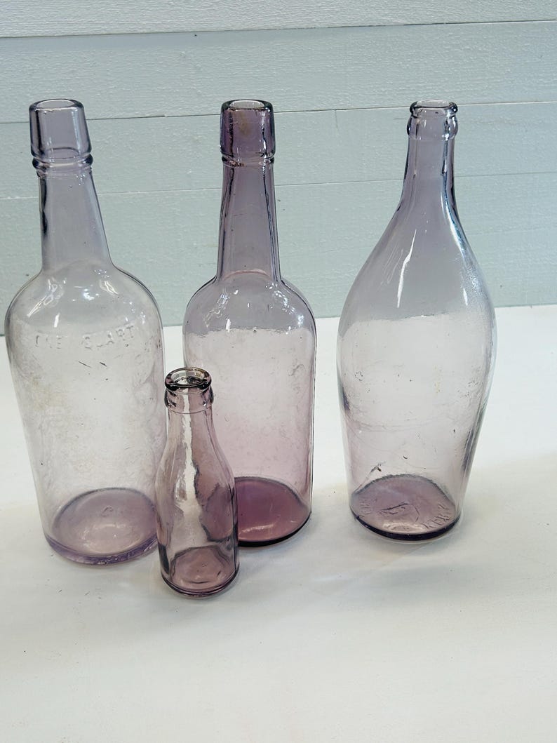 Antique Purple Glass Sun-Purple Bottle Set