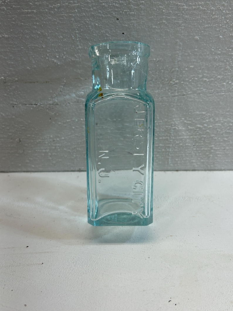 Jersey City NJ Embossed Medicine Bottle