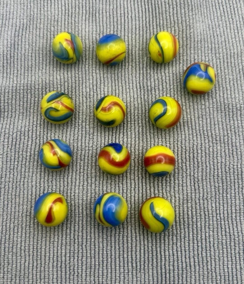 Vintage Akro Agate Superman Marbles Lot of 13 Corkscrew Yellow Red Blue Glass 5/8 Inch 15.8mm UV Reactive Collectible Toy