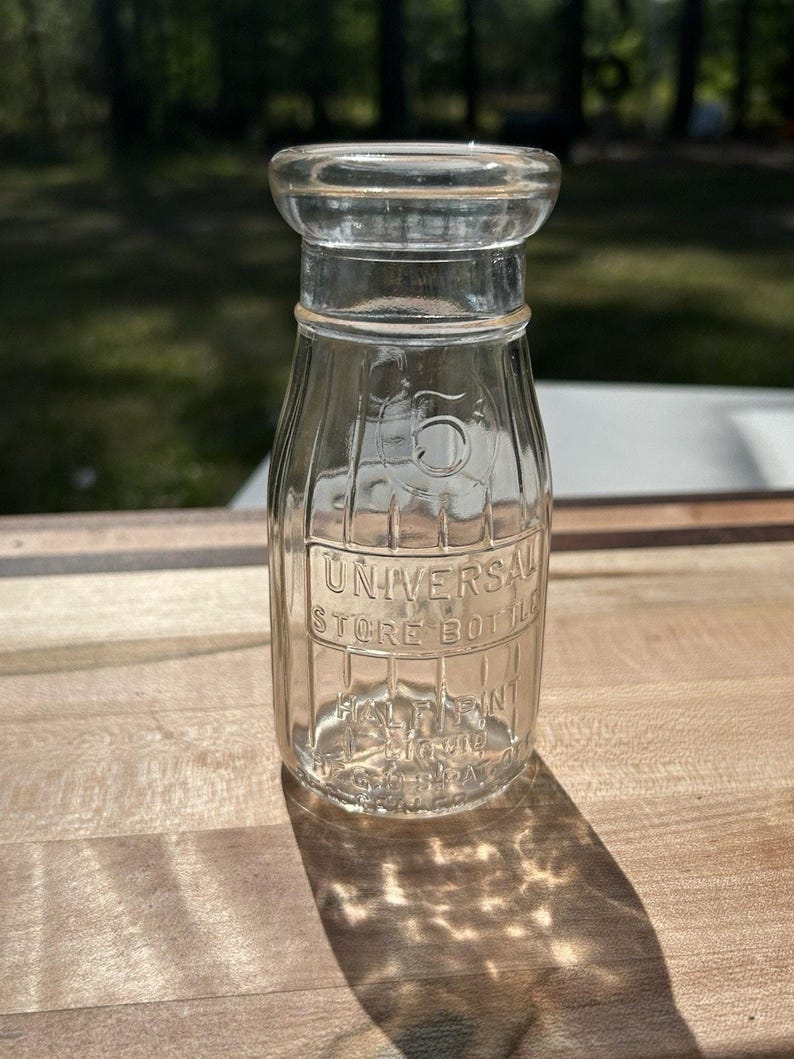 Vintage Universal Store 5 Cent Half Pint Milk Bottle