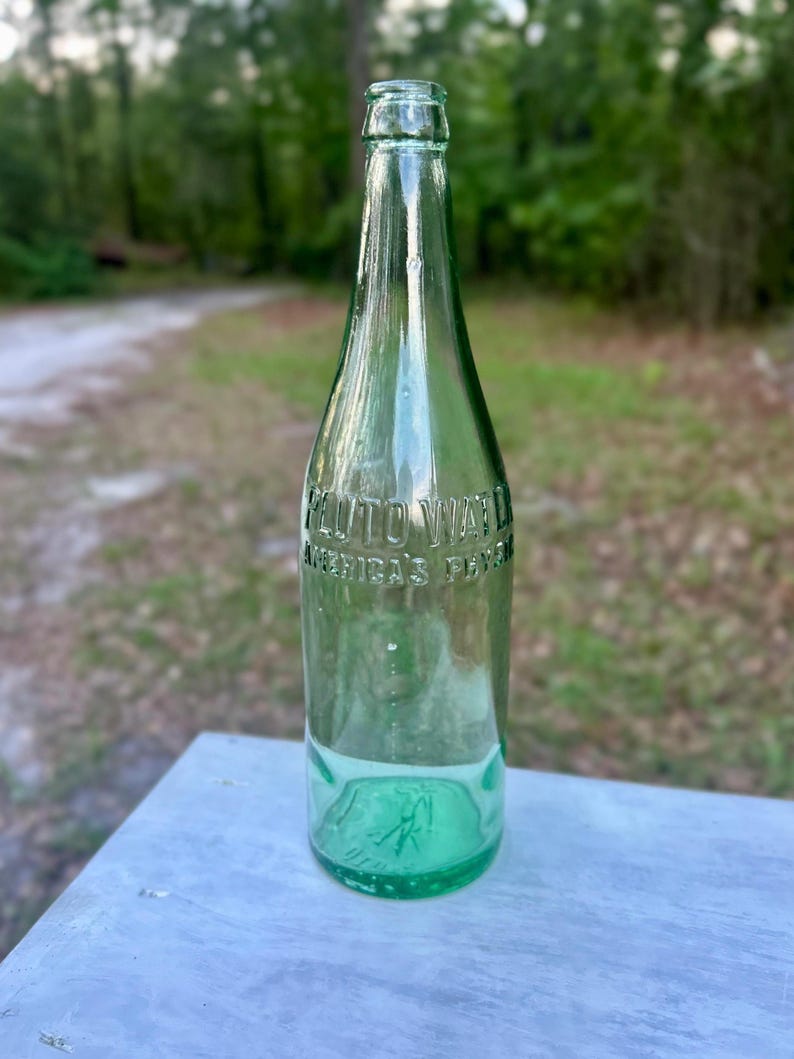 Antique Pluto Water Bottle America’s Physic Devil Logo Base Embossed Aqua Green Mineral Water c1920s — photograph 1