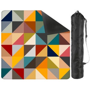 May include: A square outdoor blanket featuring a geometric pattern of multicolored triangles in shades of yellow, red, blue, brown, and gray, with a black underside and a matching black cylindrical carrying bag with a shoulder strap.