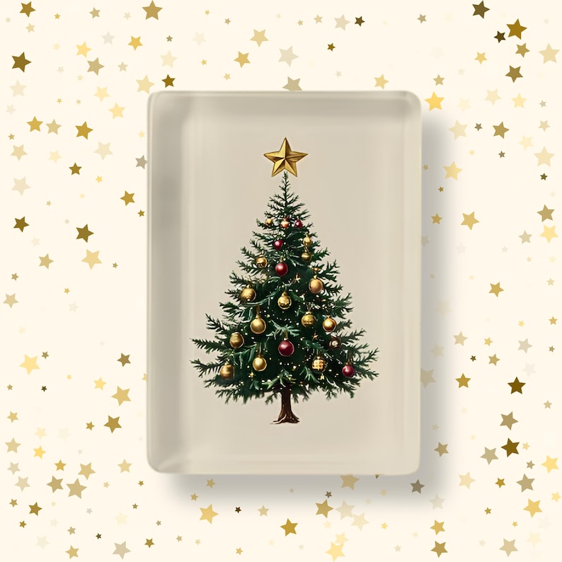 May include: A rectangular off-white tray featuring a centered illustration of a green Christmas tree decorated with gold and red ornaments and topped with a gold star. The tray has a smooth, glossy finish and clean, rounded edges.