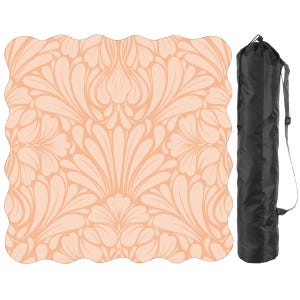 May include: A peach-colored yoga mat with a floral design and a black carrying bag. The mat has a scalloped edge and a symmetrical pattern of stylized leaves and petals. The bag is cylindrical with a shoulder strap.