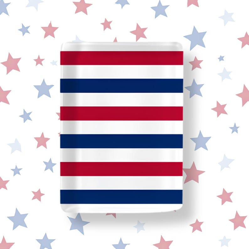 May include: A rectangular glass tray featuring a repeating horizontal striped pattern in red, white, and dark blue. The surface is smooth and glossy, with clean, sharp lines separating each color band across the entire rectangular object.