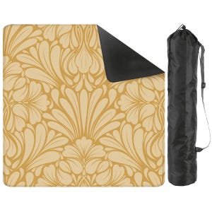 May include: A picnic blanket featuring a gold and cream floral design, with a black underside. It comes with a black carry bag with a shoulder strap. The blanket is suitable for outdoor activities.