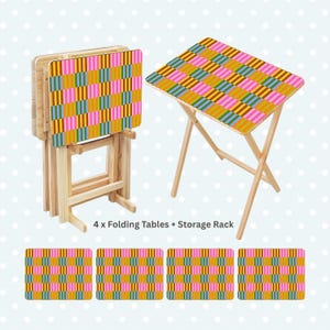 May include: Set of four folding tables with a storage rack. The tables have a colorful geometric pattern in pink, yellow, green, and brown. The text on the image reads: "4 x Folding Tables + Storage Rack."