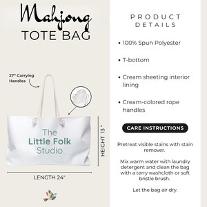 May include: A white Mahjong tote bag with 27-inch carrying handles, a T-bottom, and cream sheeting interior lining. The bag features the text The Little Folk Studio, measures 24 inches in length and 13 inches in height, and is made of 100% spun polyester.