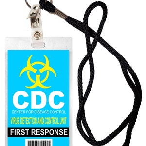 May include: A blue and yellow CDC identification card with a biohazard symbol, the text "CDC Center for Disease Control Virus Detection and Control Unit First Response" and a barcode. The card is attached to a black lanyard with a clip.