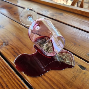 Realistic fake Wine Glass spill by Dead Head Props, Great as as a gag gift or prank!