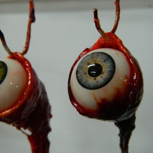 Realistic Human Ripped Out Eyeball on a Hook Ornament - Santa's Watching Halloween Prop, Halloween Decoration by Dead Head Props