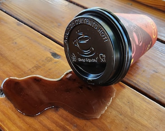 Realistic fake coffee cup spill with lid by Dead Head Props, Great as as a gag gift or prank!