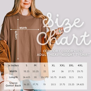 May include: A brown Comfort Colors 1717 adult heavyweight t-shirt displayed with a size chart. The chart lists width, length, and sleeve center back measurements in inches for sizes S through 4XL, with a diagram showing length and width lines.