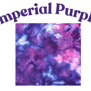 May include: A square fabric swatch featuring a tie-dye pattern in shades of deep purple, magenta, and white. The text 'Imperial Purple' is printed in a bold, dark purple font in an arc shape above the square fabric sample.