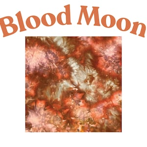 May include: A square fabric swatch featuring a tie-dye pattern in shades of deep red, burnt orange, and muted brown. The text "Blood Moon" is printed in a curved, bold, orange font above the square pattern, creating a celestial-inspired design.