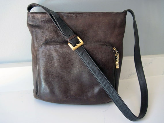 Stone Mountain Handbags  Black leather handbags, Stone mountain handbags,  Vintage leather bag