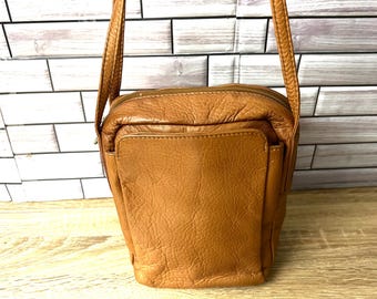 Vintage HOBO international tan brown leather cross body  .