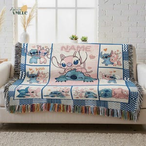 a cozy and colorful throw blanket with a cartoon character design, placed on a couch in a room with a window and some decorative elements.