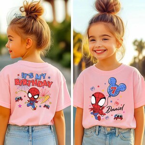 A young girl wearing a pink t-shirt with a Spiderman character and the text "It's my birthday" printed on it.