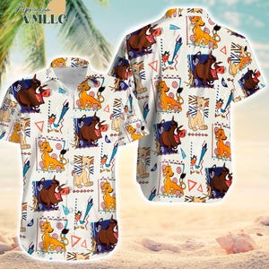 May include: White button-up shirt featuring a repeating pattern of cartoon characters, including a lion, warthog, and other figures. The shirt has short sleeves and a collared neckline. The design includes geometric shapes and stylized elements.