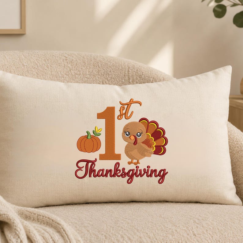 May include: A rectangular cream-colored throw pillow featuring an embroidered design with a large orange number 1, a small orange pumpkin, and a cartoon turkey. The text 1st Thanksgiving is embroidered in orange and red script lettering.