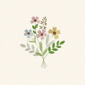 May include: Embroidered floral bouquet featuring pink, blue, and yellow flowers with green leaves and stems. The design includes detailed stitching and is tied together at the base with green thread. The background is a light beige fabric.