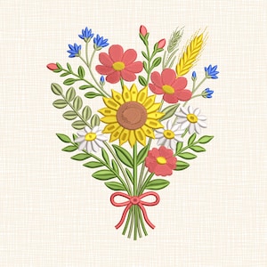 May include: Embroidered bouquet featuring a large yellow sunflower, red and white daisies, and blue wildflowers. Green leaves and stems are tied with a red ribbon. The design is on a cream-colored fabric.