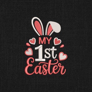 May include: Embroidered design on a black background featuring bunny ears, hearts, and the text "MY 1st Easter" in white and coral. The design is likely for Easter-themed apparel or crafts.