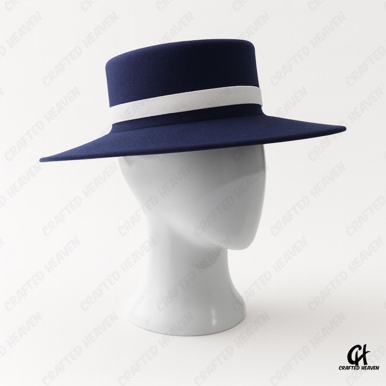 Elegant black felt top hat with wide brim and white satin band, inspired by Melania Trump’s inauguration style, displayed on white background