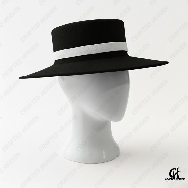 Elegant black felt top hat with wide brim and white satin band, inspired by Melania Trump’s inauguration style, displayed on white background