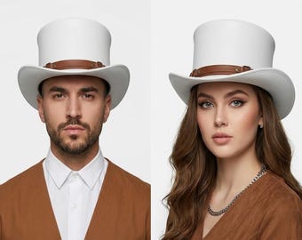 May include: A white top hat featuring a structured crown and a curved brim. The hat is accented with a thin, brown leather-like band that encircles the base of the crown, secured with small metallic studs on either side of the front.