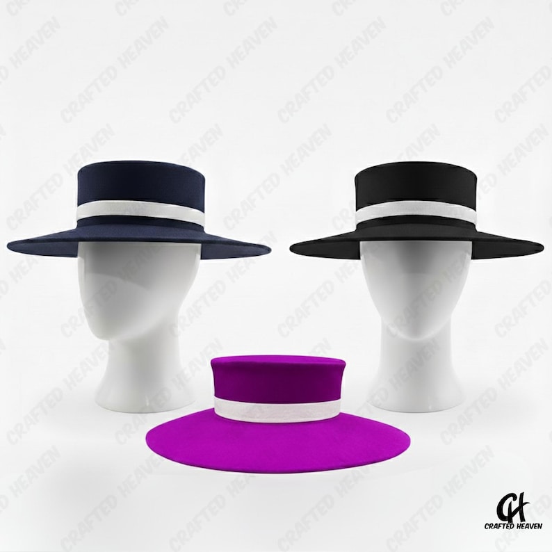 Elegant black felt top hat with wide brim and white satin band, inspired by Melania Trump’s inauguration style, displayed on white background