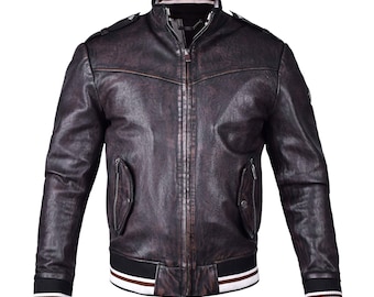 May include: A brown leather jacket with a zip-up front, two front pockets, and a ribbed collar and cuffs. The jacket has a distressed look and a bomber jacket style. The collar and cuffs have white and brown stripes.