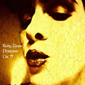 RUBY FLAME™ Perfume Oil - Red Wine, Pomegranate, Pink Lotus, Red Roses, Cinnamon, Woods